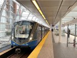 A set of Mark III Cars slows for Main Street-Science World Station